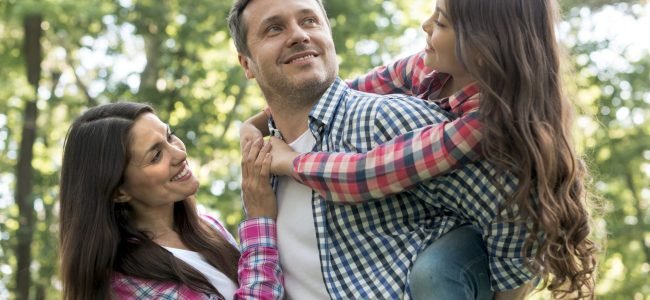 happy-family-having-fun-park